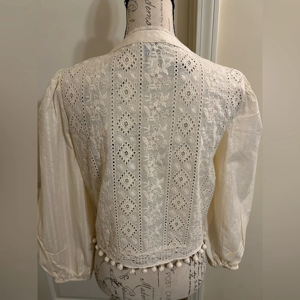 Elegant Cream Blouse with Embroidered Detailing